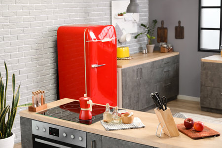Stylish counter and refrigerator in kitchenの写真素材
