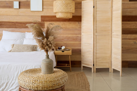 Interior of modern bedroom with wooden wallの写真素材