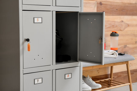 Locker with sport equipment in change-room