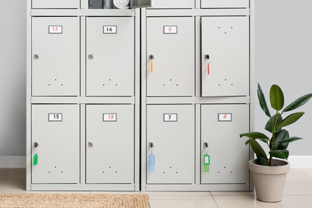 Locker with sport equipment in change-roomの写真素材