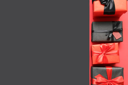 Gift boxes on color background. black friday saleの写真素材