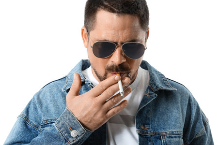 Smoking man isolated on whiteの写真素材