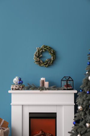 Fireplace with beautiful Christmas decorations in living roomの写真素材