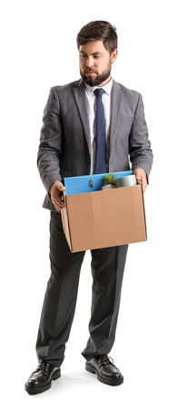 Fired young man holding box with personal stuff on white backgroundの写真素材
