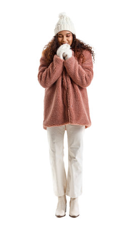 Beautiful young woman in stylish winter clothes on white backgroundの写真素材