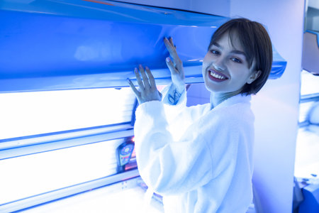 Beautiful young woman in solariumの写真素材