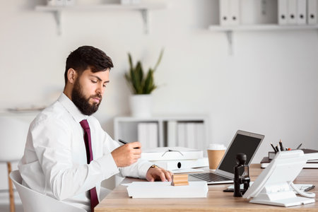 Male notary public working in officeの写真素材