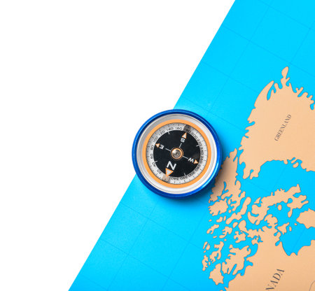 Compass and world map on white background, closeupの写真素材