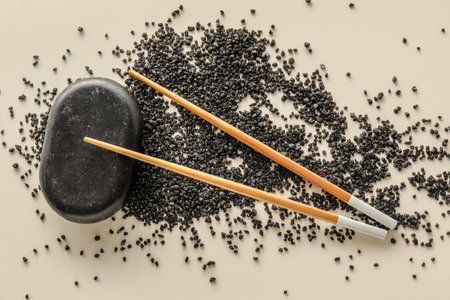 Wooden chopsticks on light background