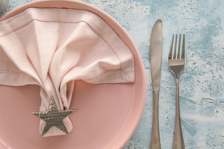 Table setting on blue backgroundの写真素材