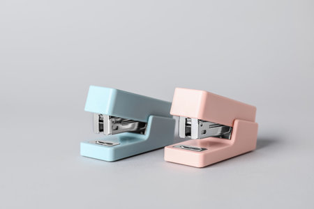 office staplers on white backgroundの写真素材