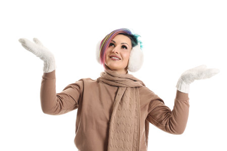 Extravagant woman in winter clothes on white backgroundの写真素材