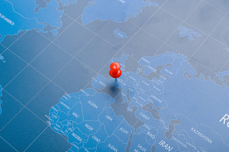 Close up view of map with red pin