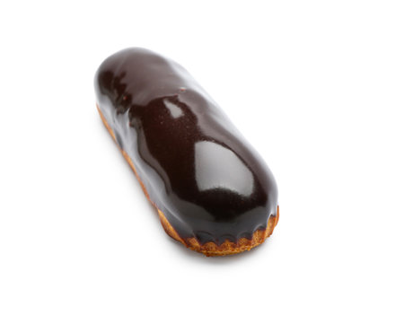 Tasty eclair in chocolate glaze on white backgroundの写真素材