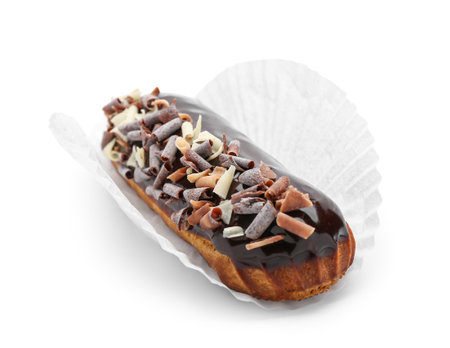 Tasty chocolate eclair on white background