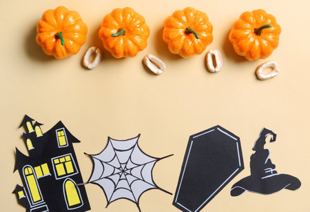 Halloween decor with pumpkins and candiesの写真素材