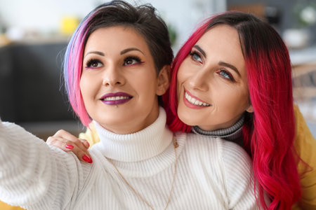Beautiful women with bright hair at home, closeup