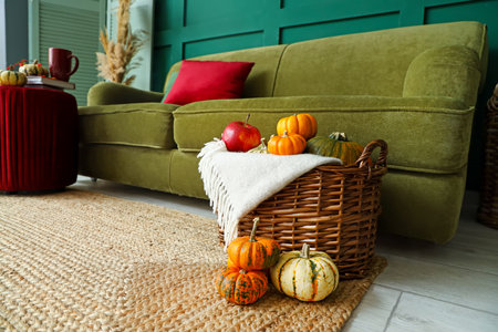 Interior of beautiful living room with autumn decorの写真素材