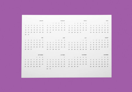 paper calendar on color backgroundの写真素材