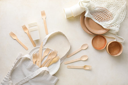Different bags with Eco tableware on white backgroundの写真素材