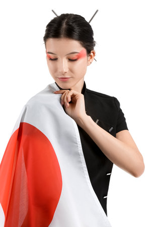 Beautiful young woman with flag of Japan isolated on whiteの写真素材