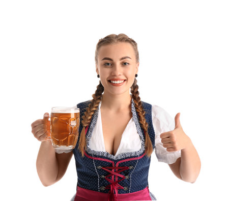 Young Octoberfest waitress with beer showing thumb-up on white backgroundの写真素材