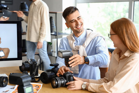 Young photographers during classes in studioの写真素材
