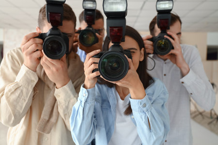 Group of photographers during classes in studioの写真素材