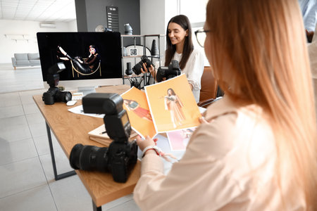 Young photographers during classes in studioの写真素材