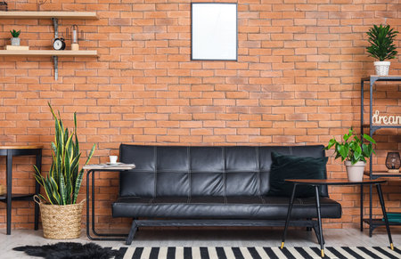 Interior of stylish living room with houseplants and couchの写真素材