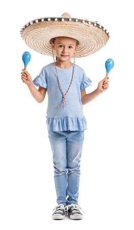Cute little Mexican girl in sombrero hat with maracas on white backgroundの写真素材