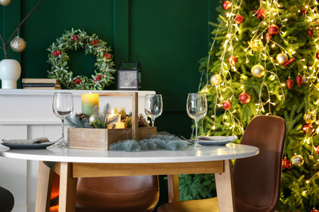 Interior of living room with table setting for Christmas dinnerの写真素材