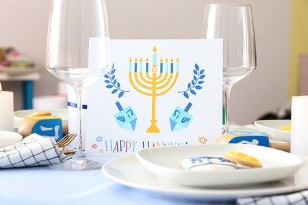 Table setting for Hanukkah celebration at homeの写真素材