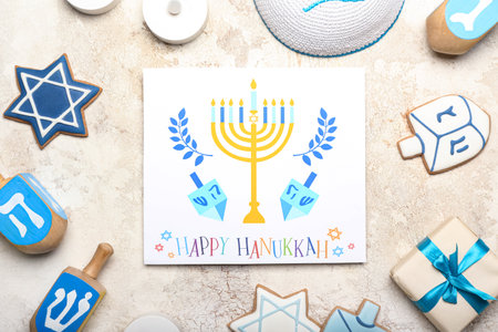 Different symbols of Hanukkah and greeting card on grunge backgroundの写真素材
