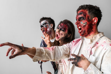 Scary zombies on light backgroundの写真素材