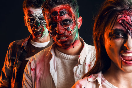 Scary zombies on dark backgroundの写真素材
