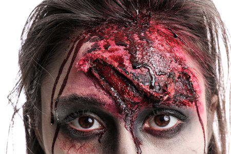 Scary zombie woman on white background, closeupの写真素材