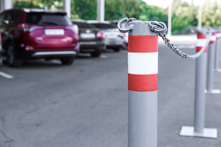 Parking limiter with red and white stripes, closeupの写真素材