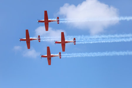 Modern airplanes flying in blue sky