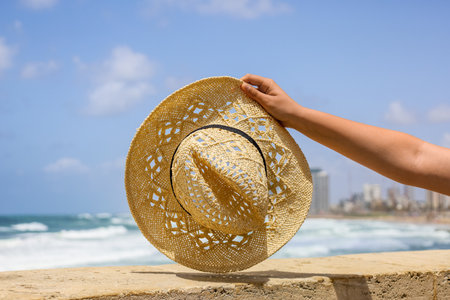 Woman with stylish hat near sea, closeupの写真素材