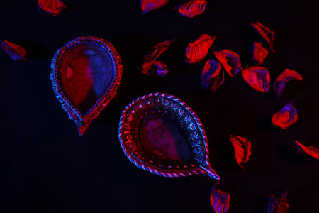 Diya lamps for Diwali on dark background