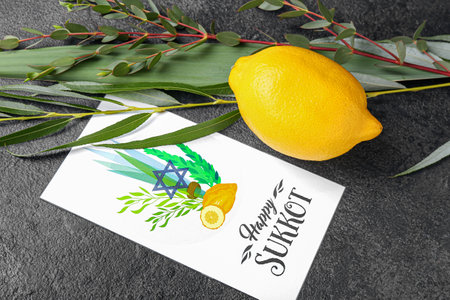 Sukkot festival symbols and greeting card on gray backgroundの写真素材