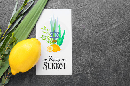 Sukkot festival symbols and greeting card on gray backgroundの写真素材