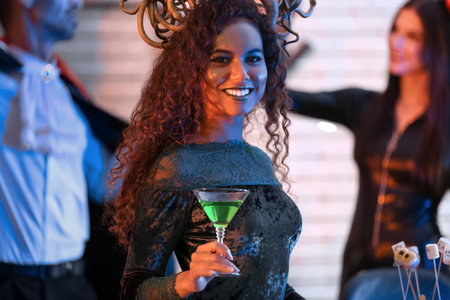 People having fun at Halloween partyの写真素材