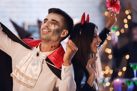 People having fun at Halloween partyの写真素材