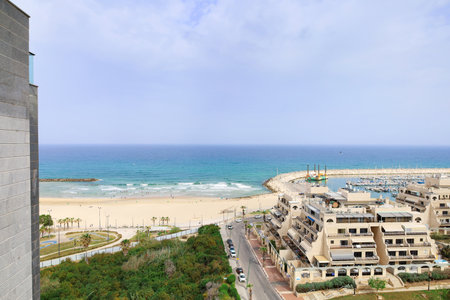 Beautiful view of the city near blue sea waterの写真素材
