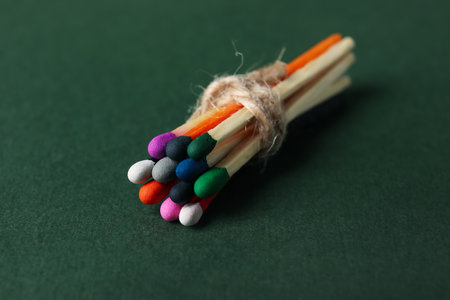 Bunch of matches on green backgroundの写真素材