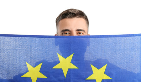 Young man with flag of European Union on white backgroundの写真素材