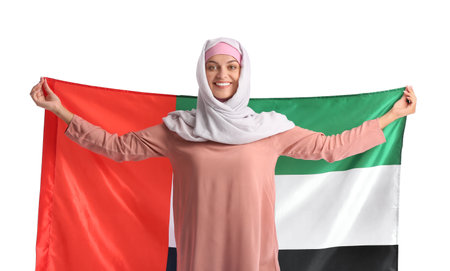 Young woman in traditional clothes and with the national flag of UAE on white backgroundの写真素材