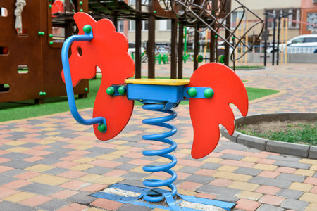 rocking horse on playground in city park